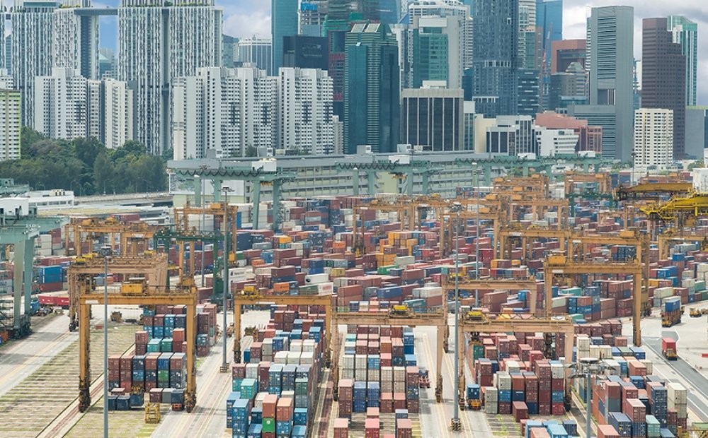 Panoramic view of Singapore harbor with Singapore city background.