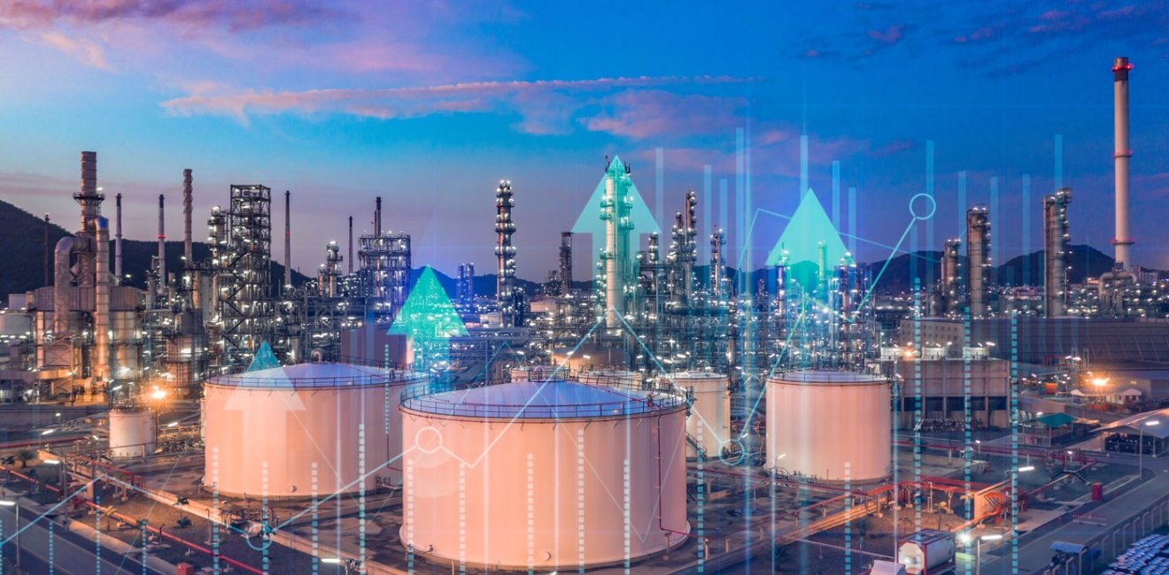 Oil​ refinery​ with oil storage tank with price graph and petrochemical​ plant industrial background at twilight, Aerial view oil and gas refinery at twilight.