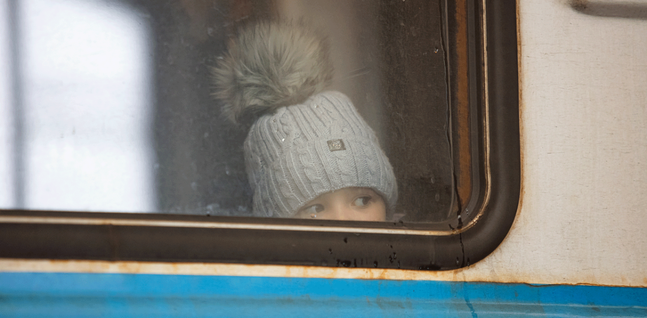 Lviv, Ukraine - March 7, 2022: Ukrainian refugees on Lviv railway station waiting for train to escape to Europe