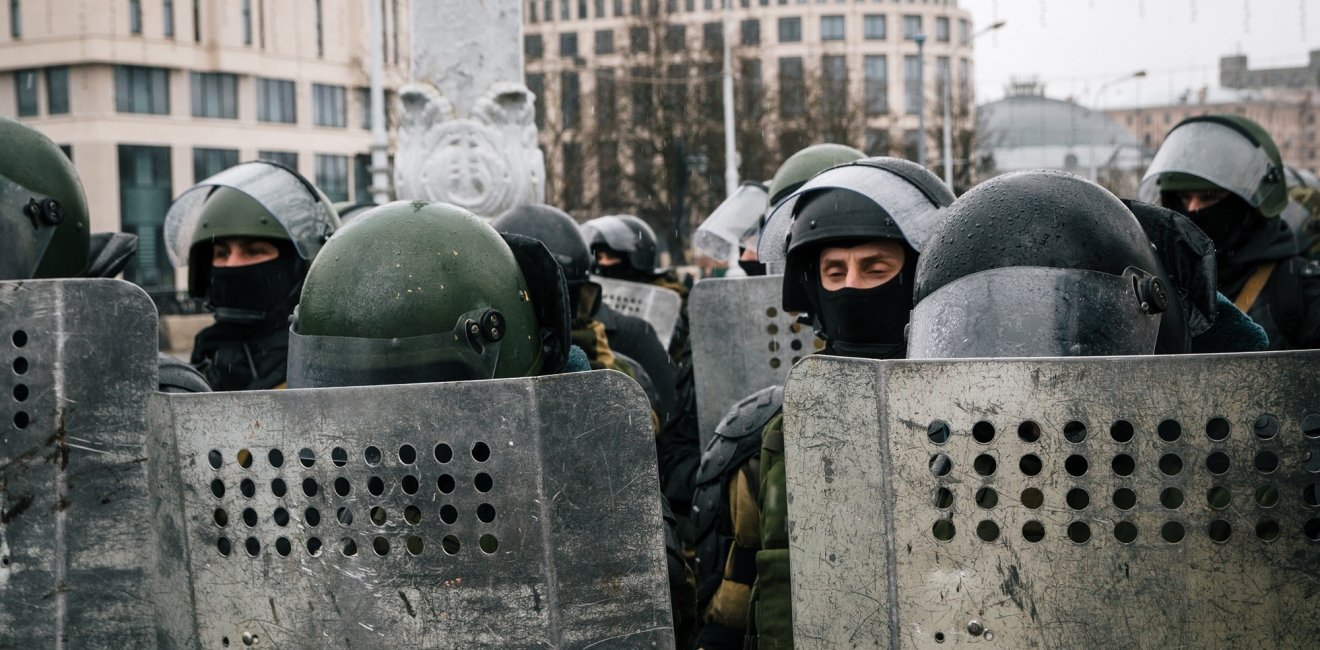 Special police unit with shields against protesters. Belarusian people participate in the protest against Lukashenko and the current authorities.