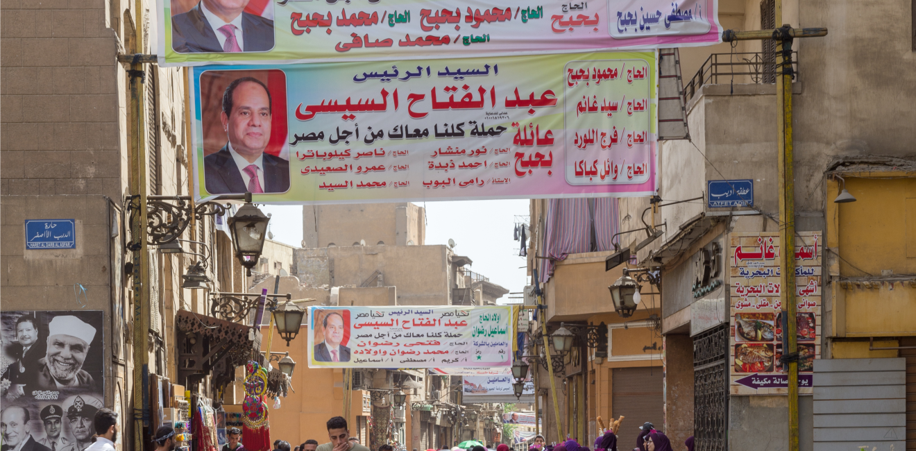 Banners supporting current Egyptian president Abdel-Fattah El-Sisi for a second term for the presidential elections at crowded Al Moez Street, Gamalia district