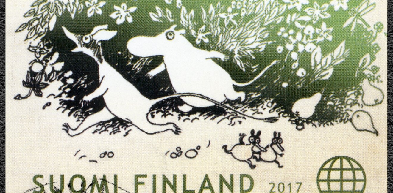 A stamp printed in Finland showing the characters of Tove Jansson's fairy tales.