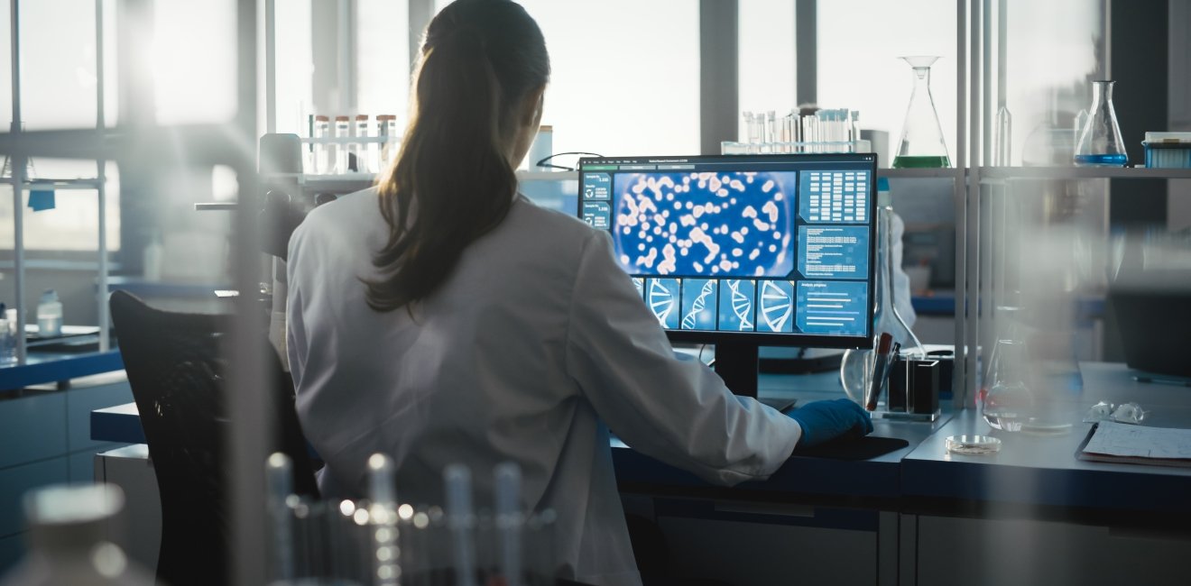 Scientist working on a computer