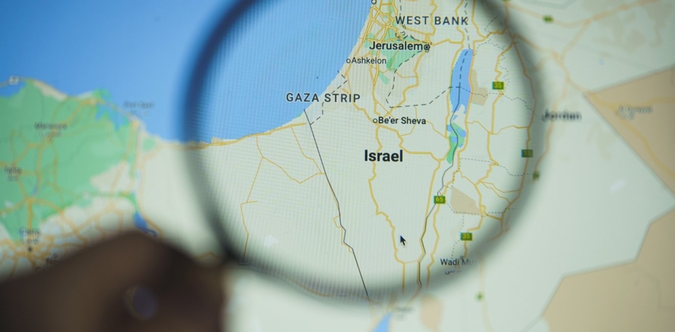 Map of Israel and Vicinity Showing Gaza Strip under a magnifying glass