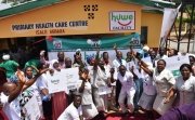 Health workers celebrating the launch of the Basic Health Care Provision Fund (known as ‘huwe’) in Nigeria.