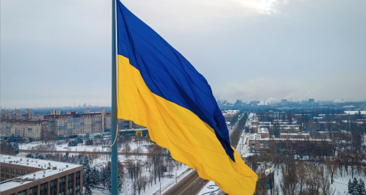 The aerial view of the Ukraine flag in winter