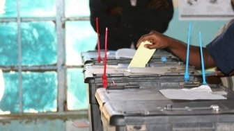 A voter casts a ballot in Kenya in 2007. The 2007 election saw a great deal of post-election violence, in part because of issues with the electoral body. Photo by Juliana Rotich, via Flickr. Creative Commons.