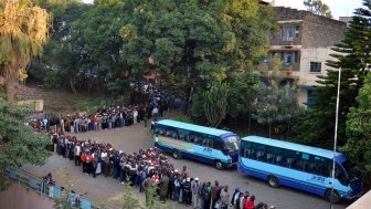 Citizens line up to vote in the 2013 Kenyan elections. Photo by Commonwealth Secretariat, via Flickr. Creative Commons.