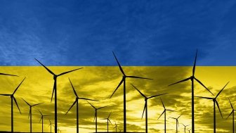 Ukrainian flag superimposed over wind turbines