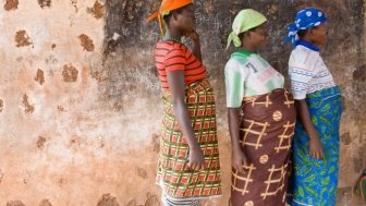 Pregnant women wait for a checkups in an abandoned schoolhouse used for mobile clinics in Gbangu-Nagbo, Ghana. 