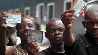 Congolese with their voting cards