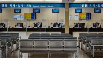 An empty payment counter at a medical center in South Korea.