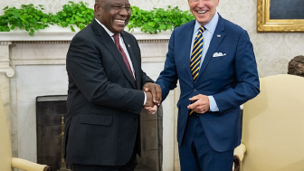 President Joe Biden and South African President Cyril Ramaphosa shake hands in the Oval Office