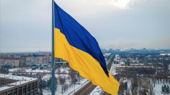 The aerial view of the Ukraine flag in winter