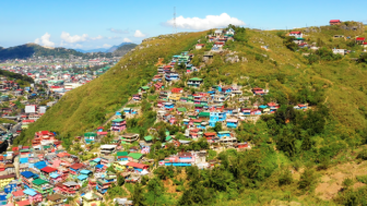 Colorful Houses in La Trinidad, Benguet, Philippines, courtesy of Fly_and_Dive/Shutterstock.com. 