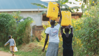 women carrying water in Uganda