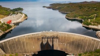 Concrete arch dam in the Kariba Gorge of the Zambezi river basin between Zambia and Zimbabwe. Dmitriy Kandinskiy/Shutterstock.