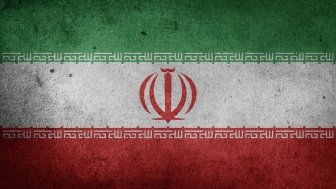 Iranian flag on a dark background