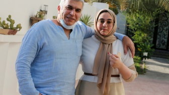 Nabeel Rajab and his daughter pose after he is freed from prison