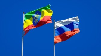 Flags of Ethiopia and the Russian Federation flying in the wind