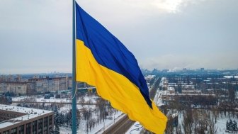 Ukraine Flag Over a Winter Landscape