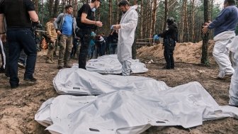 Izyum, Kharkiv Oblast, Ukraine. September 17, 2022. Exhumation of 450 bodies from a mass grave. Most of the victims were tortured and killed during Russian occupation.