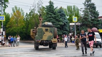 Tank on city street