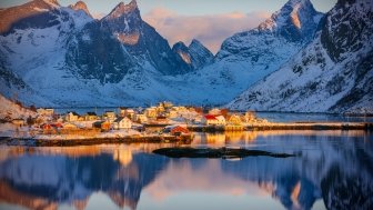 Colorful winter sunrise in the fishing village of Reine, Lofoten archipelago, Norway, above the arctic circle