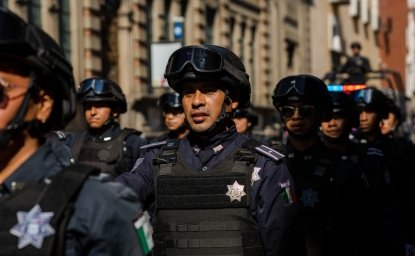 Puebla, Mexico - September 16, 2022: Puebla state police officers walk the streets in a surveillance operation