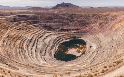 Aerial view of an exhausted open pit copper mine near Ajo, Arizona, USA.