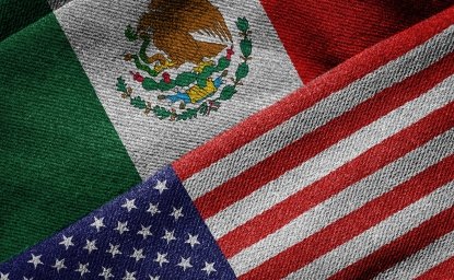 3D rendering of the flags of USA and Mexico on woven fabric texture.