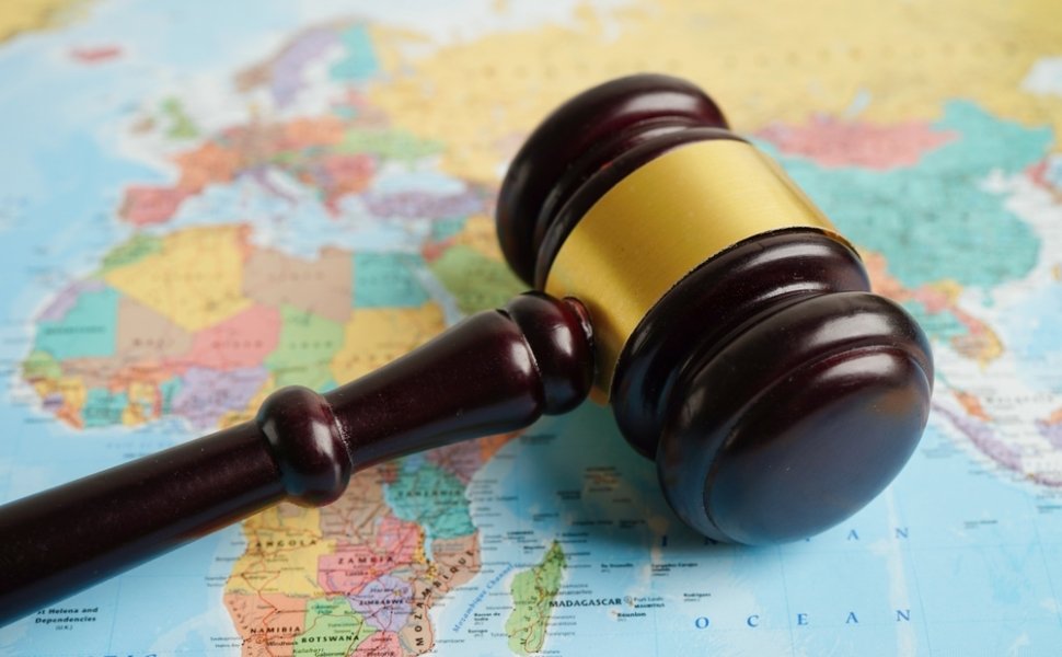 Gavel over map of Africa