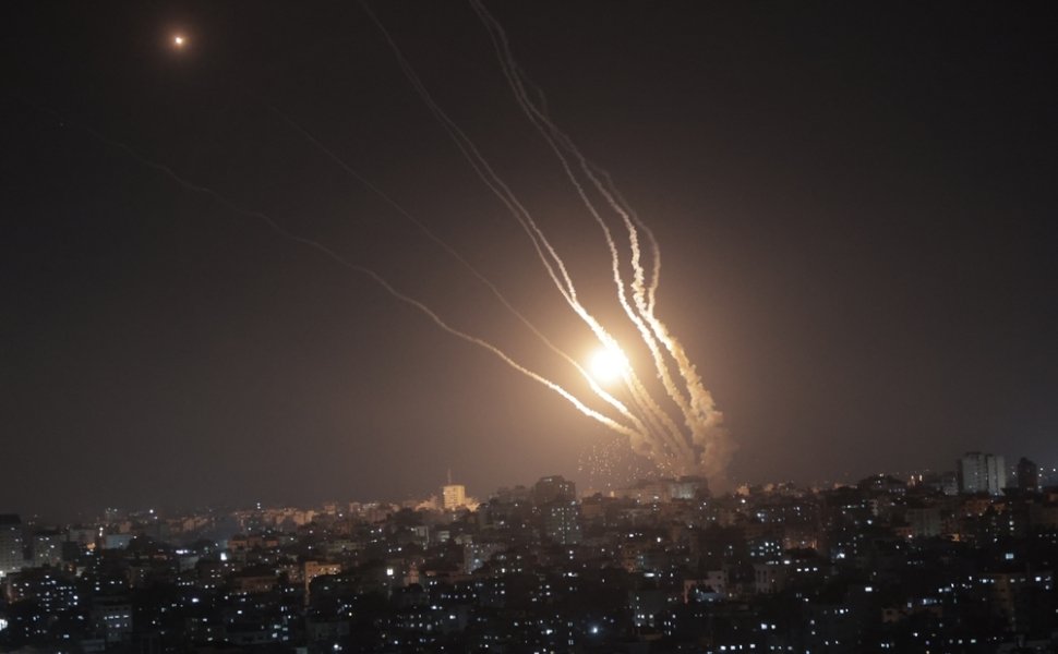 Smoke trails from rockets fired from Gaza at night