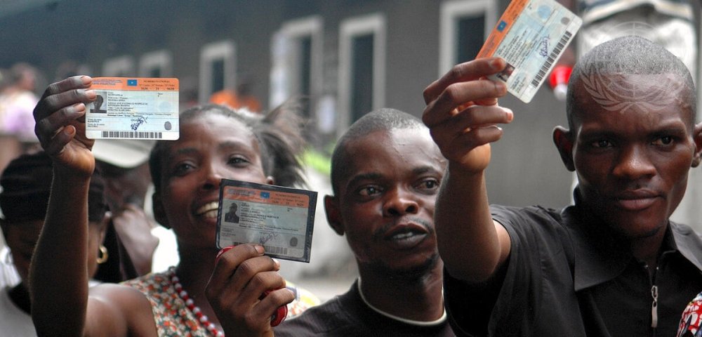 Congolese with their voting cards